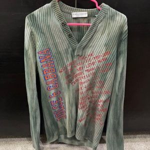 Dolce and Gabbana pull over sweater.